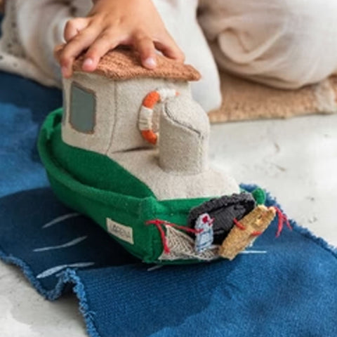 Juguete textil RIDE & ROLL Barco con camino enrollable