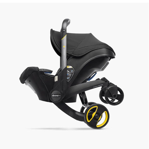 DOONA Autoasiento a Carriola + Base NEGRA