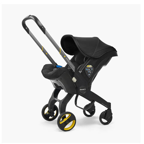 DOONA Autoasiento a Carriola + Base NEGRA