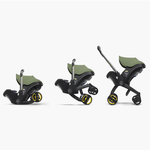 DOONA Autoasiento a Carriola + Base PISTACHE
