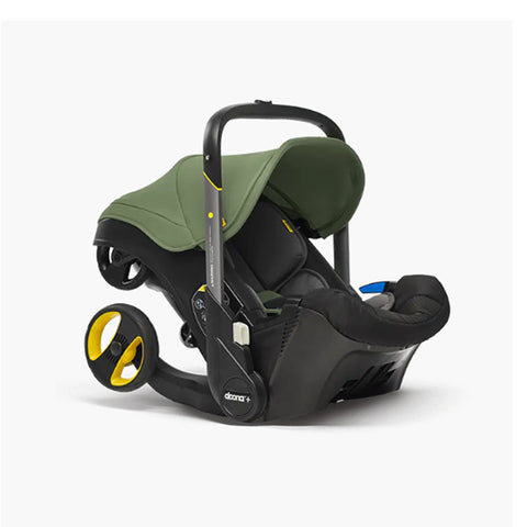 DOONA Autoasiento a Carriola + Base PISTACHE