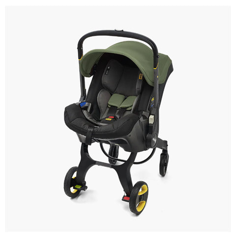 DOONA Autoasiento a Carriola + Base PISTACHE