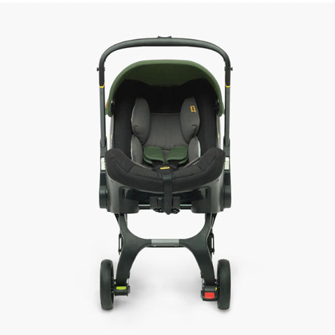 DOONA Autoasiento a Carriola + Base PISTACHE