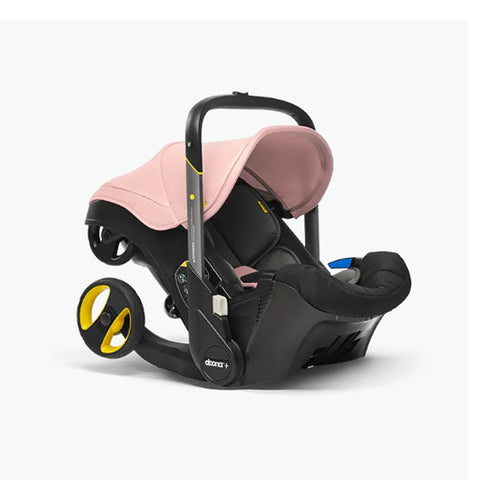 DOONA Autoasiento a Carriola + Base ROSA