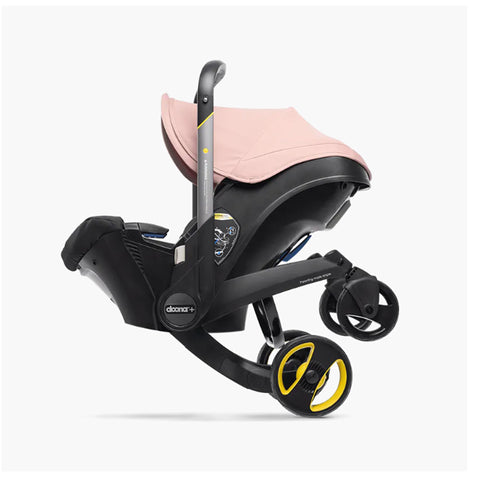 DOONA Autoasiento a Carriola + Base ROSA