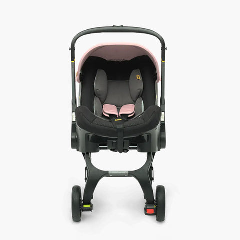 DOONA Autoasiento a Carriola + Base ROSA