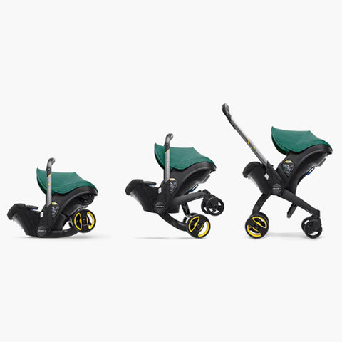 DOONA Autoasiento a Carriola + Base VERDE