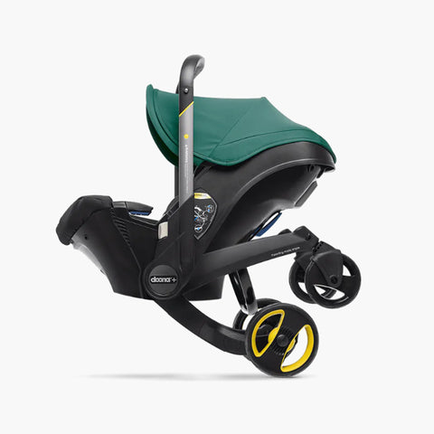 DOONA Autoasiento a Carriola + Base VERDE